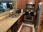 Beautiful new granite counter tops add to the luxury